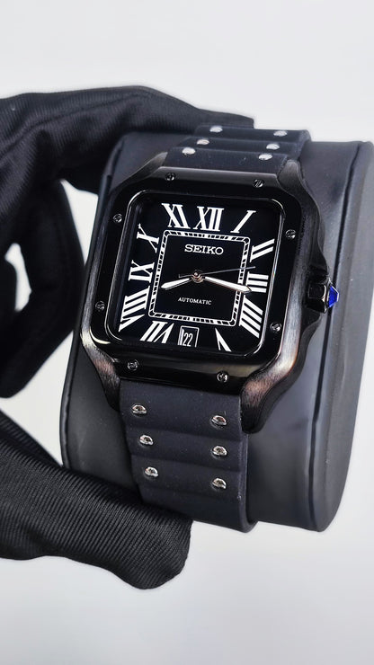 Santos (Black) Seiko NH35 automatic mod watch. A full watch shot showing a black dial with white Roman numerals and a black rubber strap.